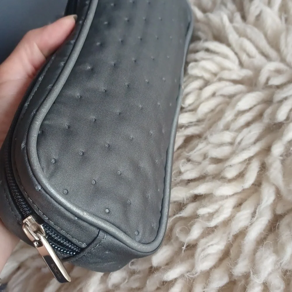 TUMI cosmetic bag